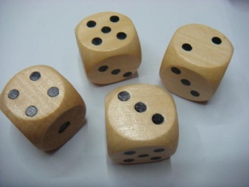 Natural color wooden dice wiith pips