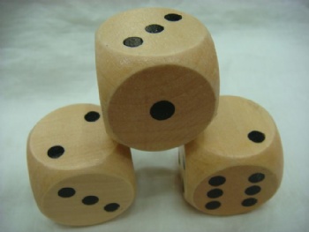 Natural color wooden dice wiith pips